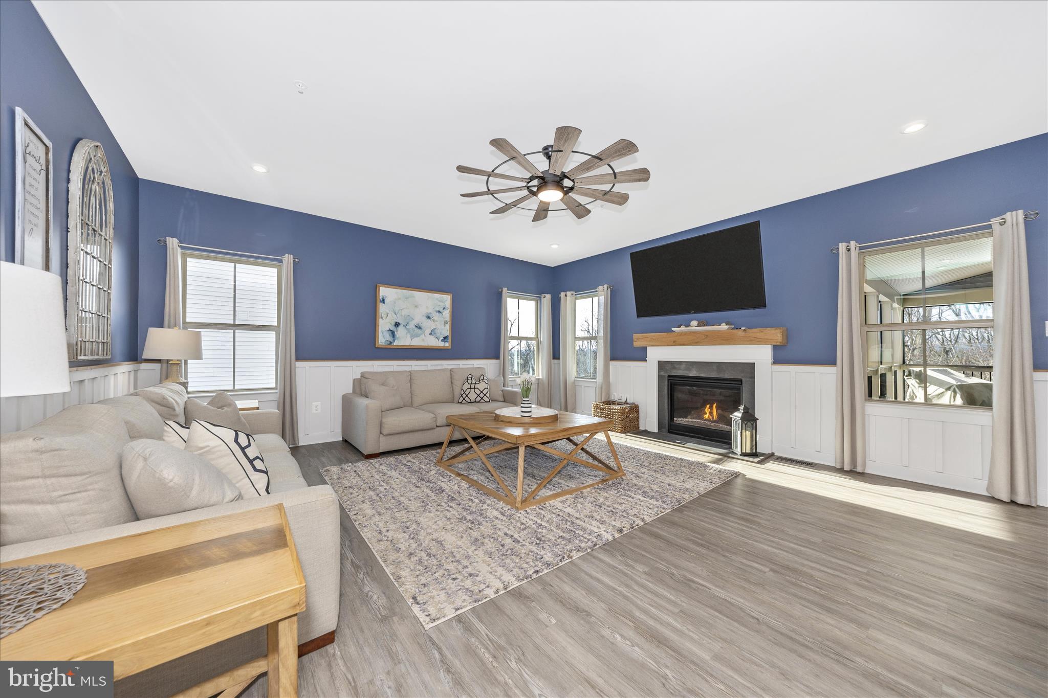 6832 Woodridge Road New Market, MD 21774 - Photo 8 of 49 Natl Gas fireplace, Screened covered porch access