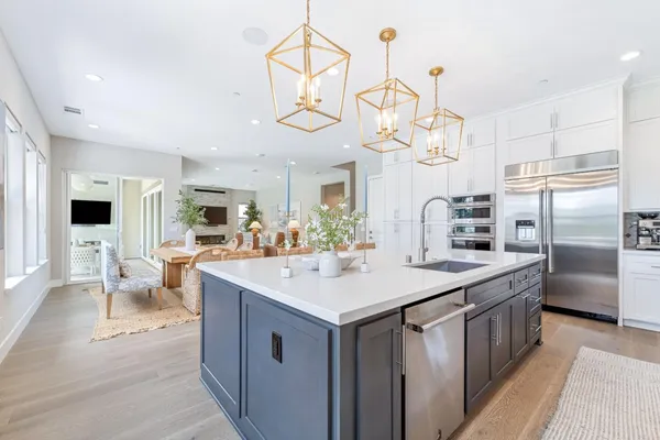 a dining room with furniture and entryway