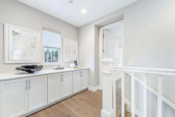a bedroom with a large bed and a large window