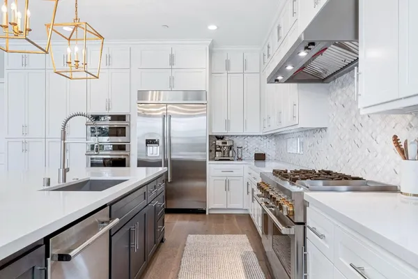 a dining room with furniture window and wooden floor