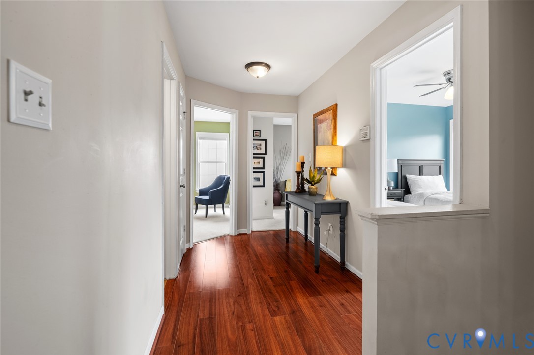 6356 Springcrest Lane Henrico, VA 23231 - Photo 17 of 43 a living room with furniture and a wooden floor
