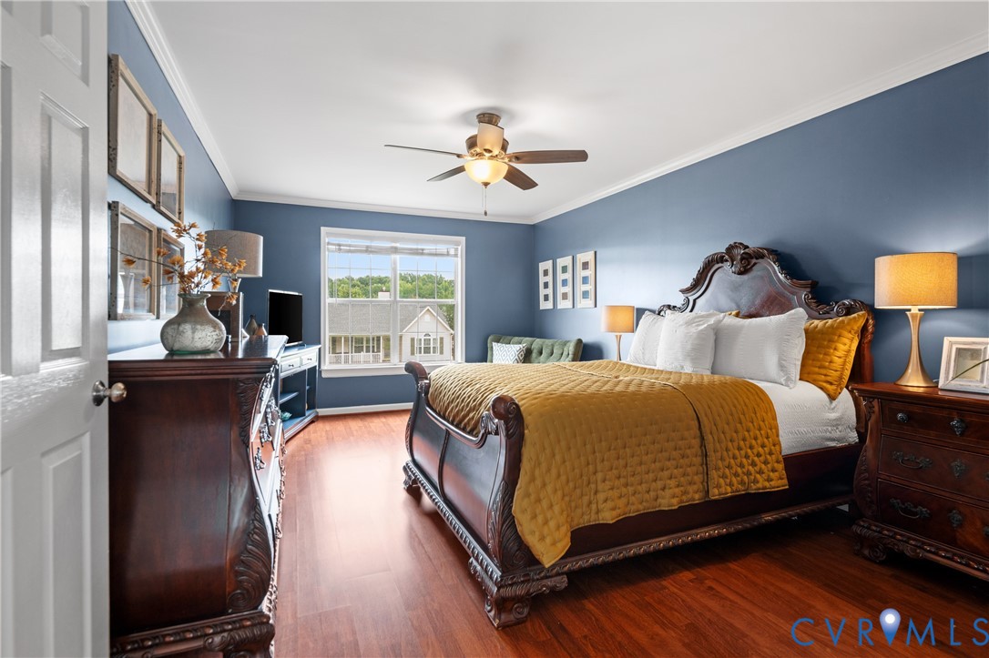 6356 Springcrest Lane Henrico, VA 23231 - Photo 18 of 43 a bedroom with a bed and wooden floor