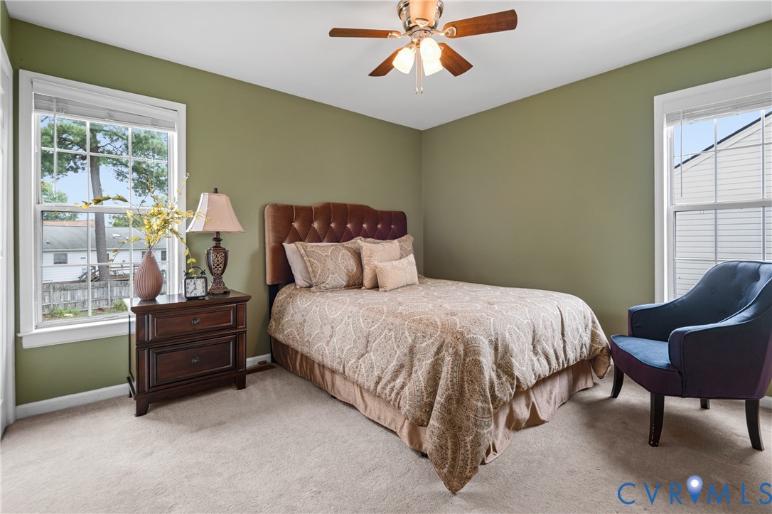 6356 Springcrest Lane Henrico, VA 23231 - Photo 22 of 43 a bedroom with a bed and window