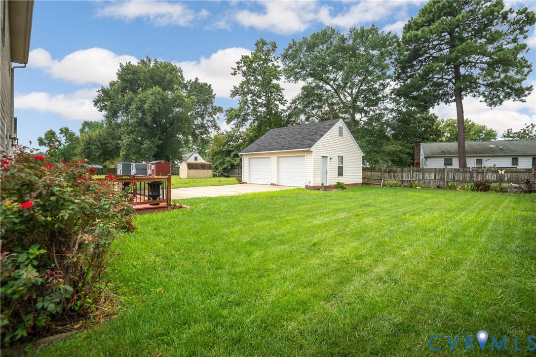 6356 Springcrest Lane Henrico, VA 23231 - Photo 32 of 43 a front view of a house with garden