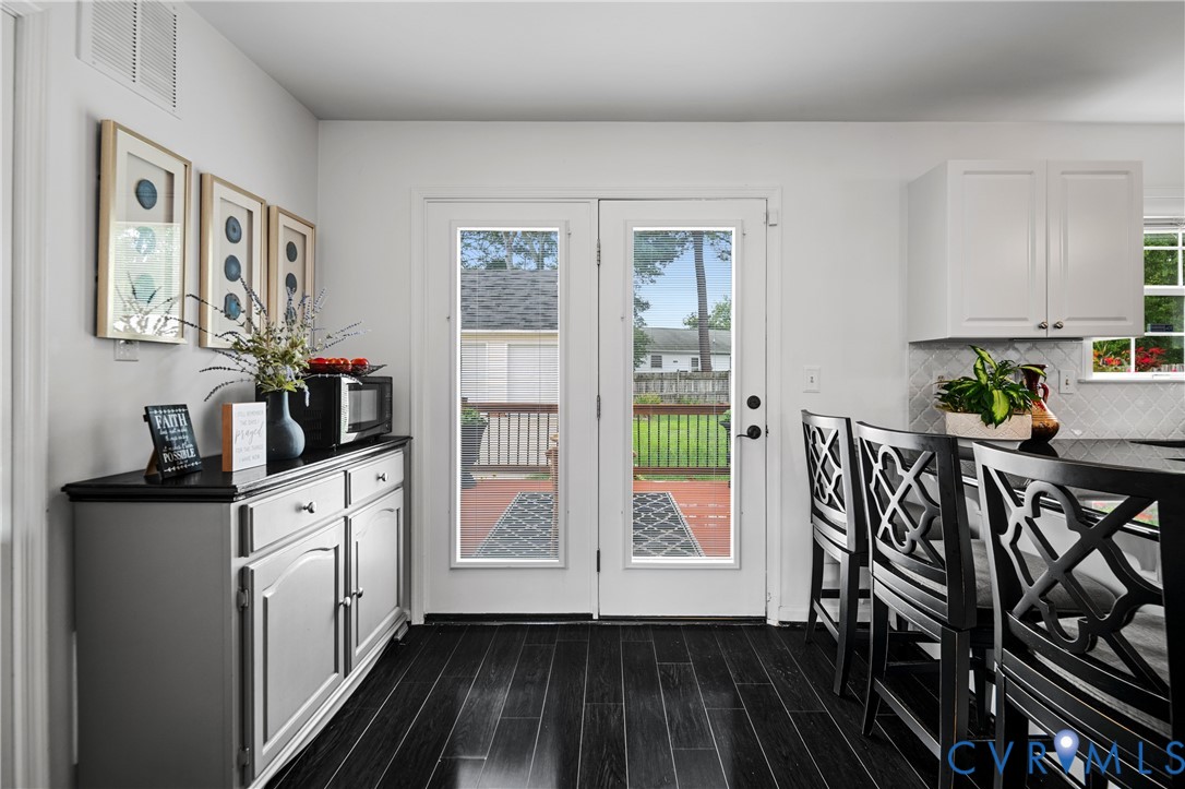 6356 Springcrest Lane Henrico, VA 23231 - Photo 6 of 43 a open kitchen with a white stove top oven and sink