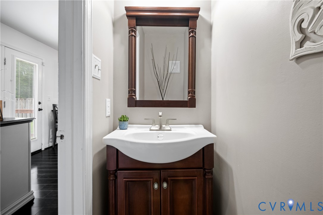 6356 Springcrest Lane Henrico, VA 23231 - Photo 9 of 43 a bathroom with a sink and a mirror