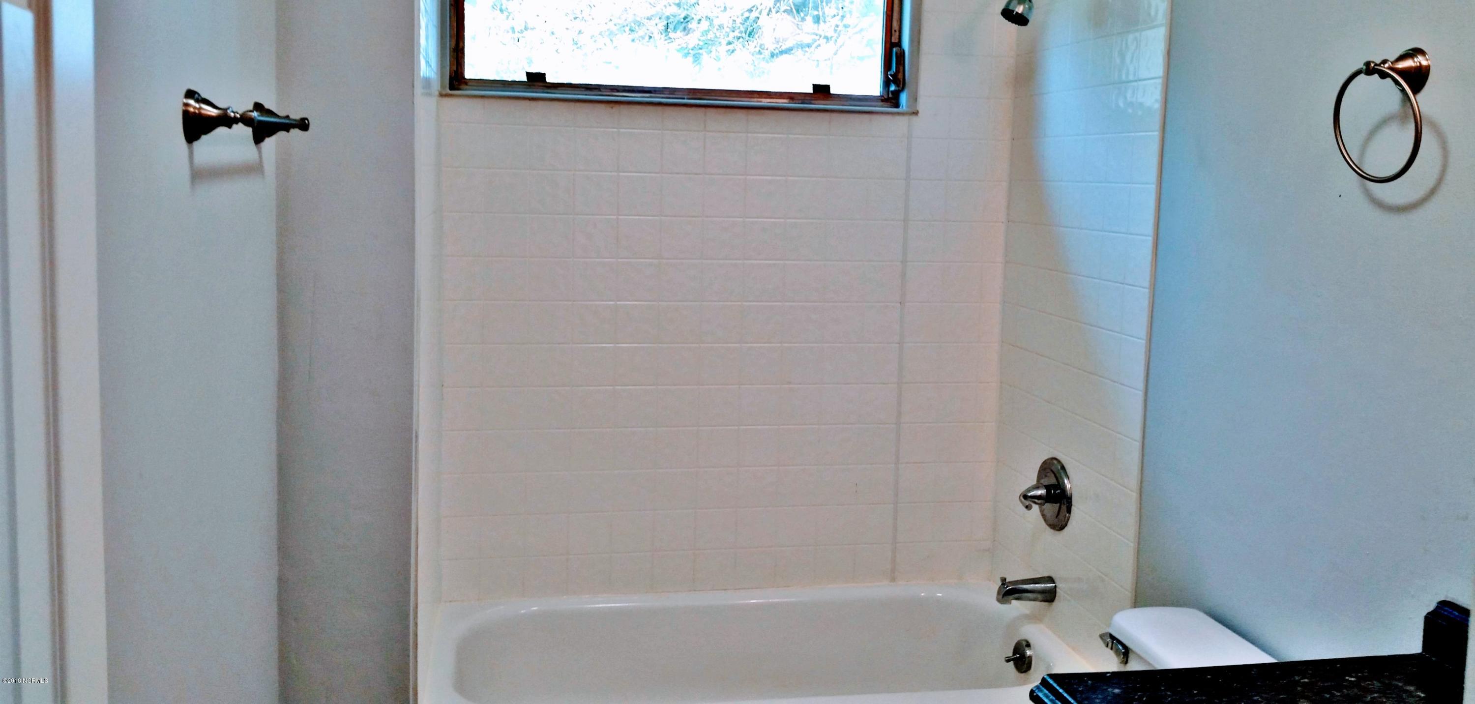 706 Tully Hill Road Kinston, NC 28504 - Photo 11 of 16 Completely updated bathroom.