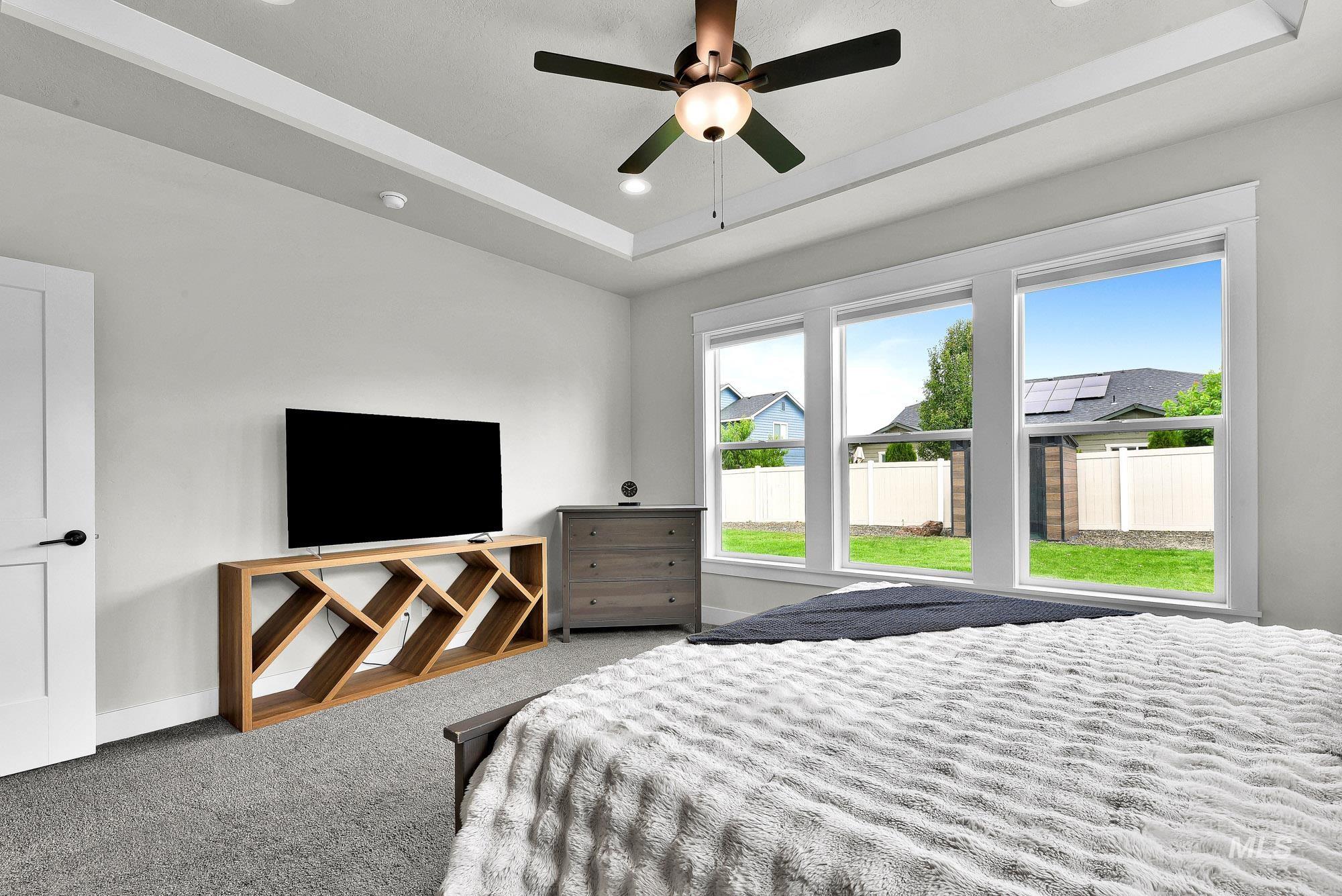 5676 East Zaffre Ridge Street Boise, ID 83716 - Photo 26 of 50 Triple window array with white trim, offering views of the surrounding area