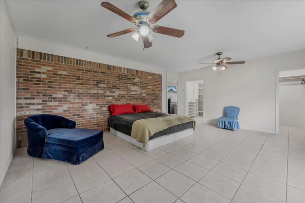 a white refrigerator freezer sitting in a kitchen