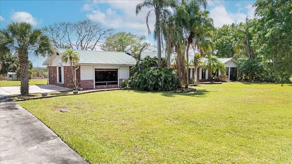 a bedroom with a bed and a cabinets