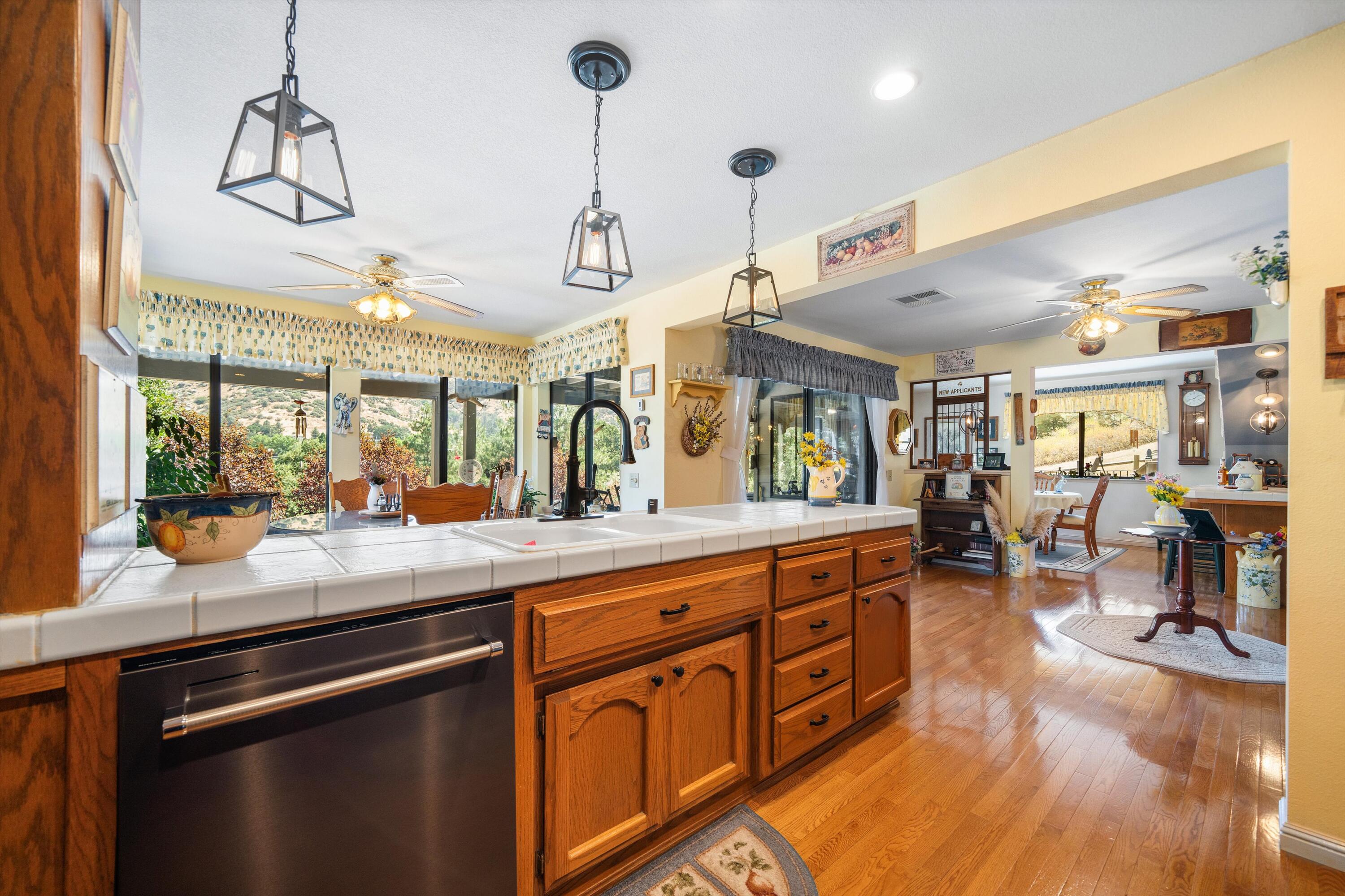 26460 Brian Place Tehachapi, CA 93561 - Photo 11 of 50 a kitchen with lots of counter top space