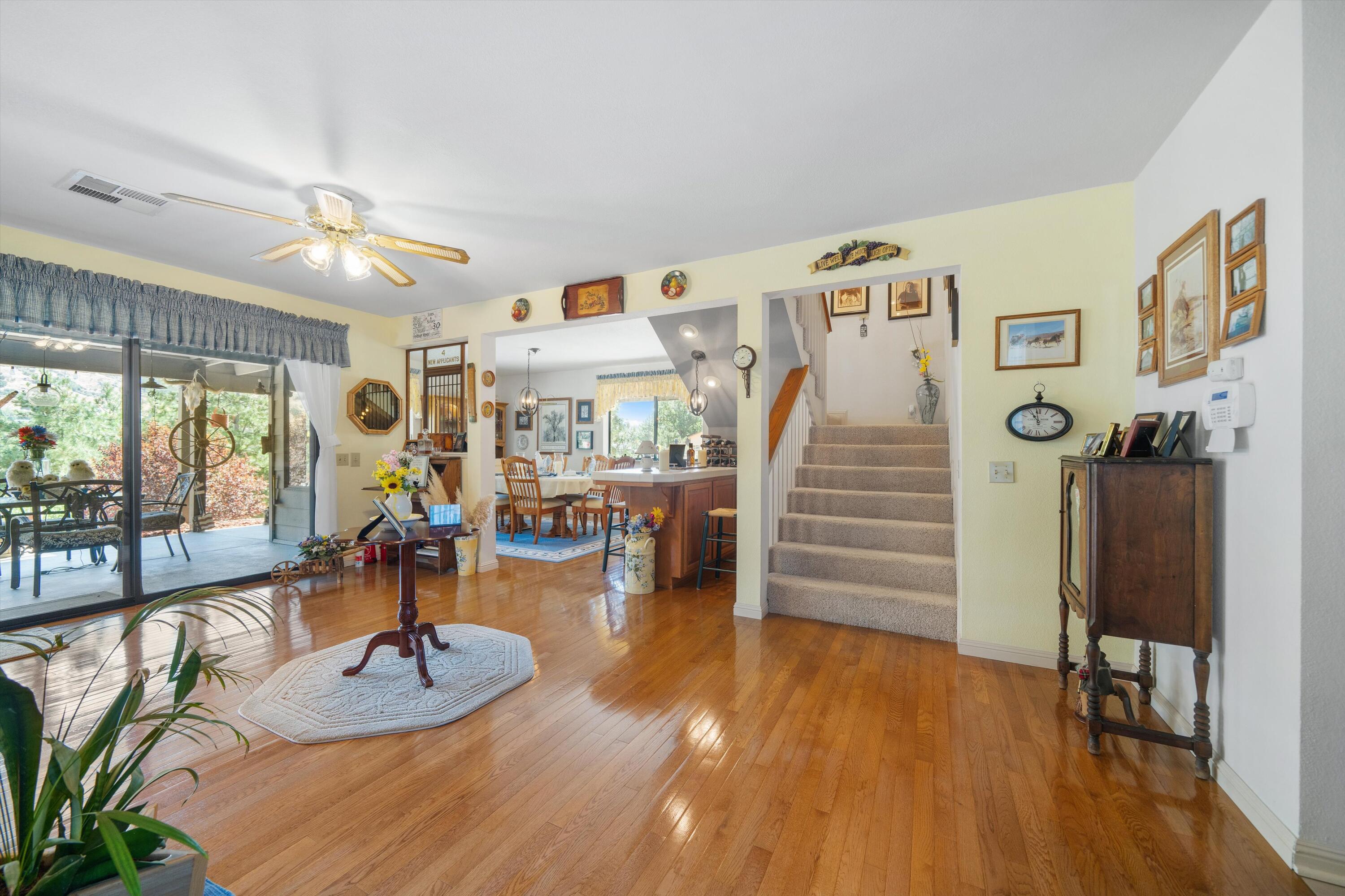 26460 Brian Place Tehachapi, CA 93561 - Photo 12 of 50 a living room with furniture and wooden floor