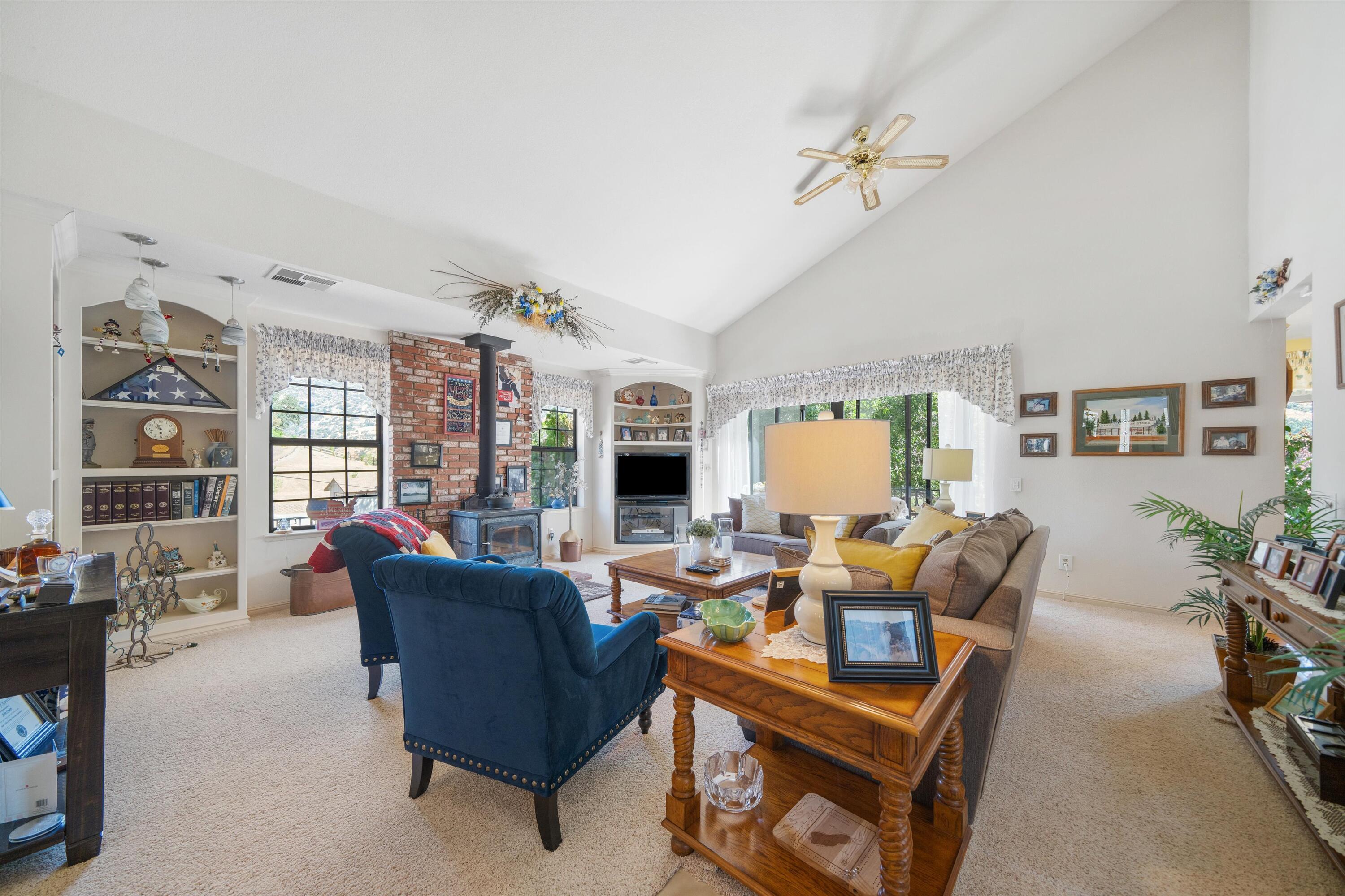 26460 Brian Place Tehachapi, CA 93561 - Photo 3 of 50 a living room with furniture and a large window