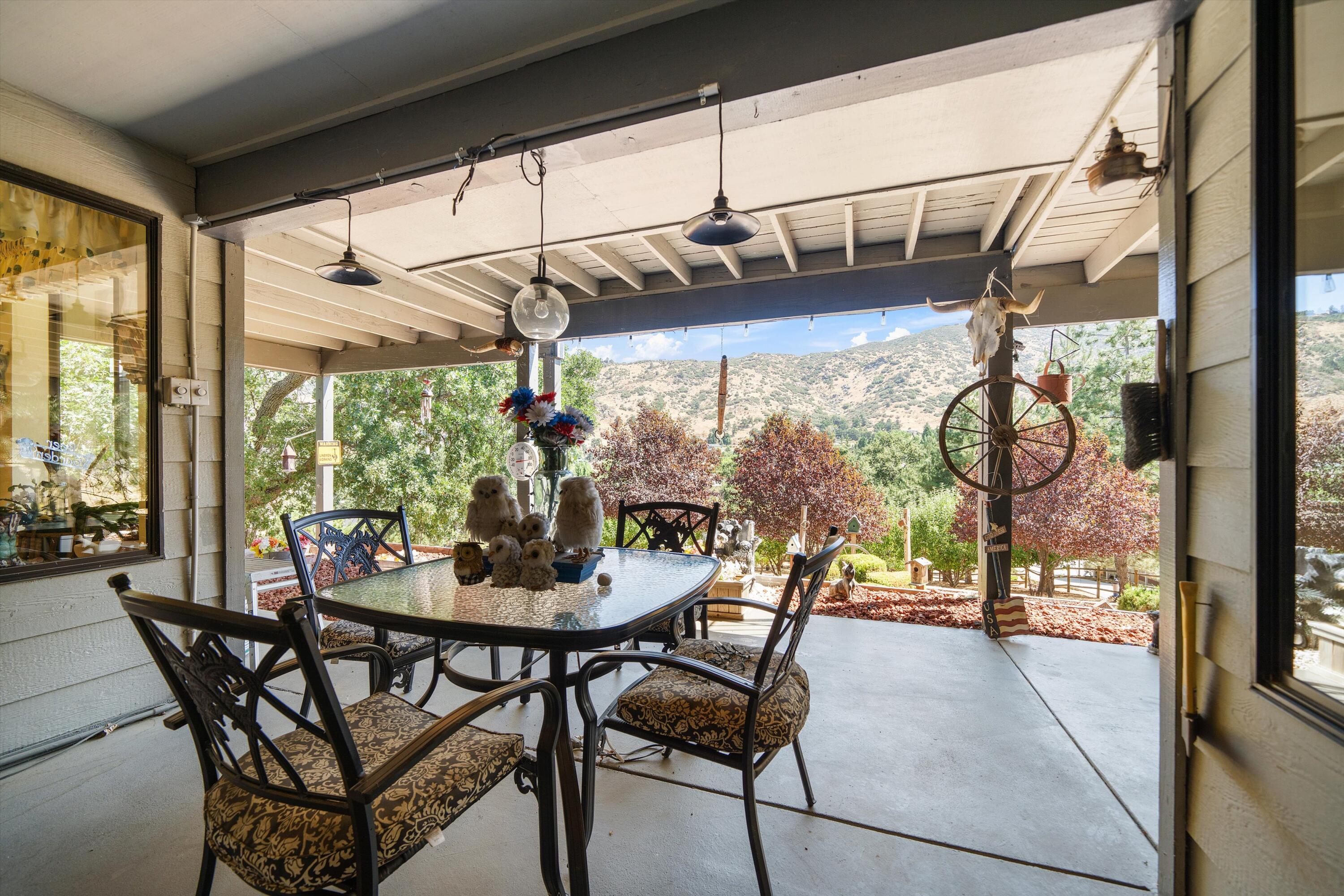 26460 Brian Place Tehachapi, CA 93561 - Photo 32 of 50 a dining room with furniture and window