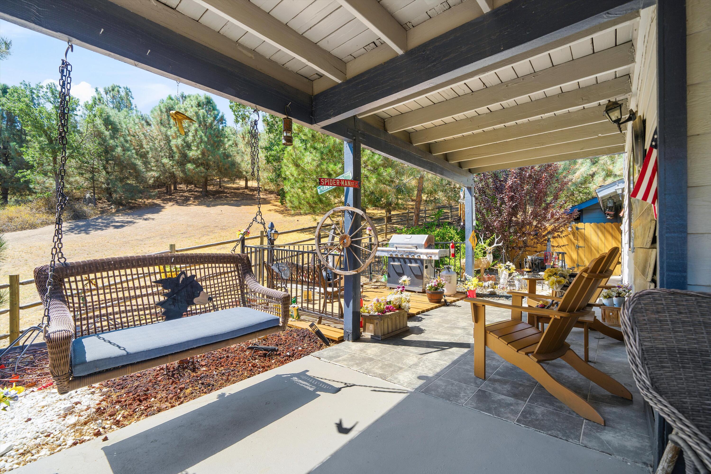 26460 Brian Place Tehachapi, CA 93561 - Photo 33 of 50 a outdoor space with lots of trees in the background