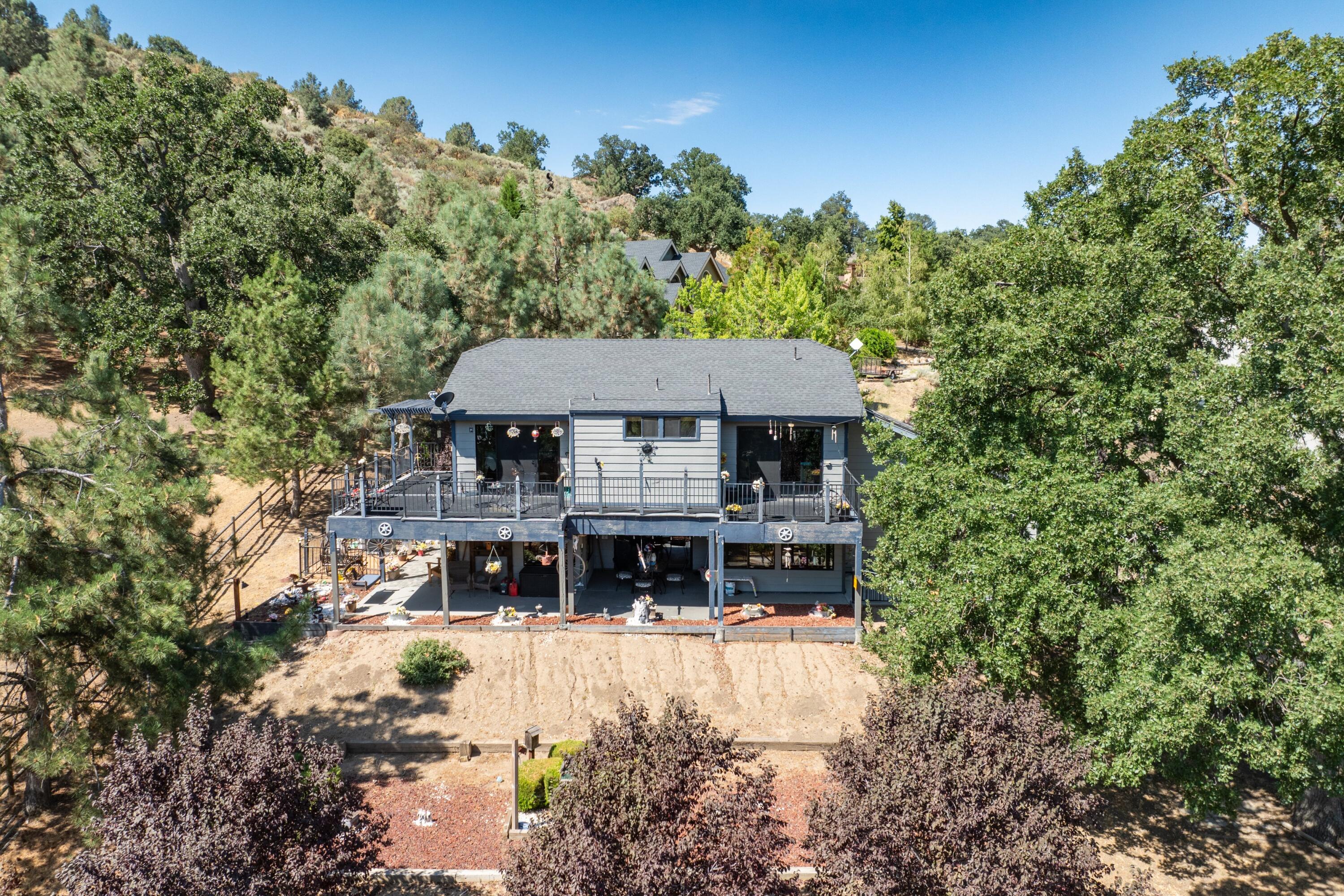 26460 Brian Place Tehachapi, CA 93561 - Photo 37 of 50 a house view with a outdoor space
