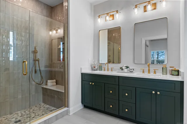 a living room with furniture and view of kitchen