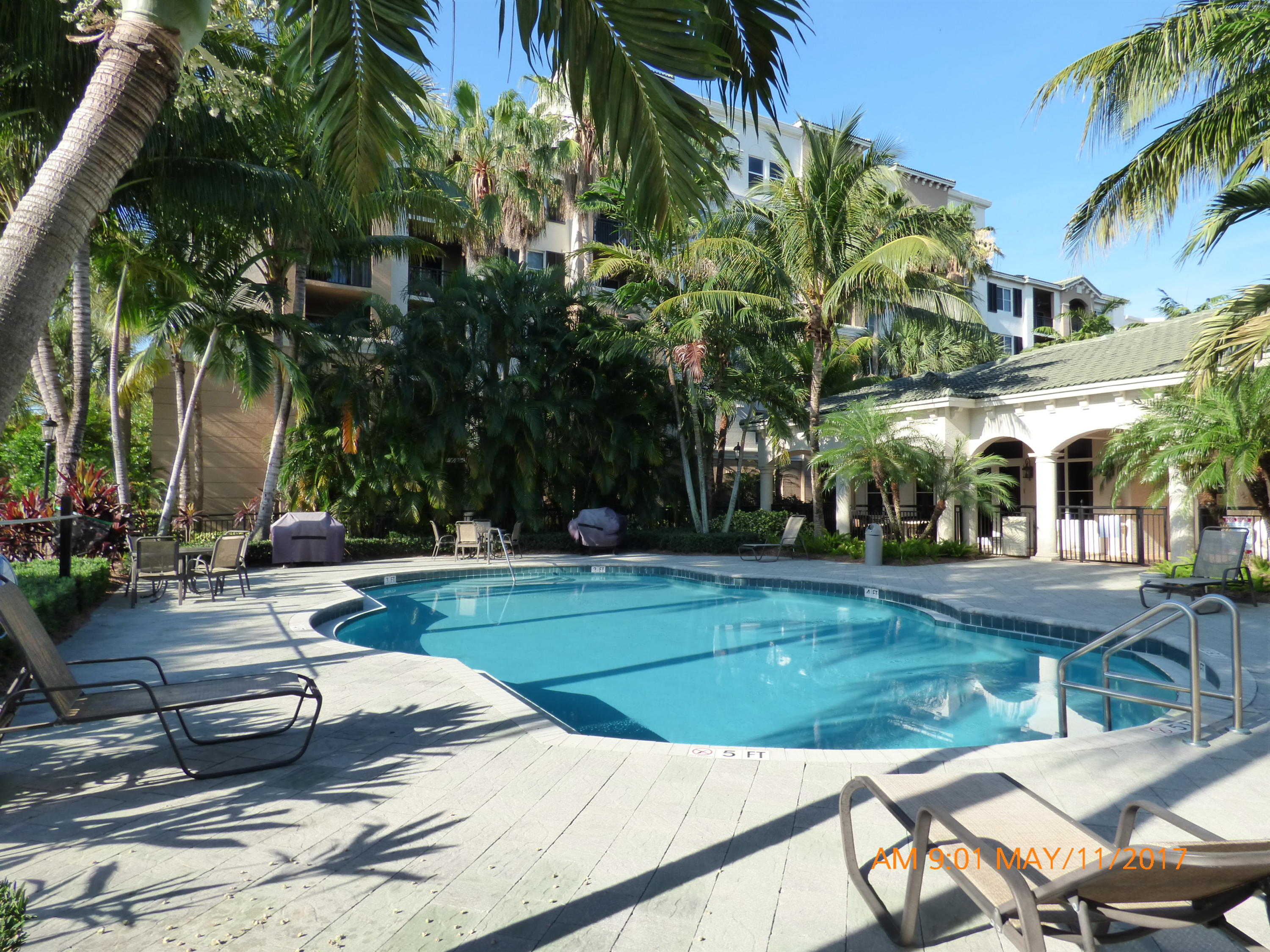 1660 Renaissance Commons Boulevard, Unit 2118 Boynton Beach, FL 33426 - Photo 16 of 19 Clubhouse Pool