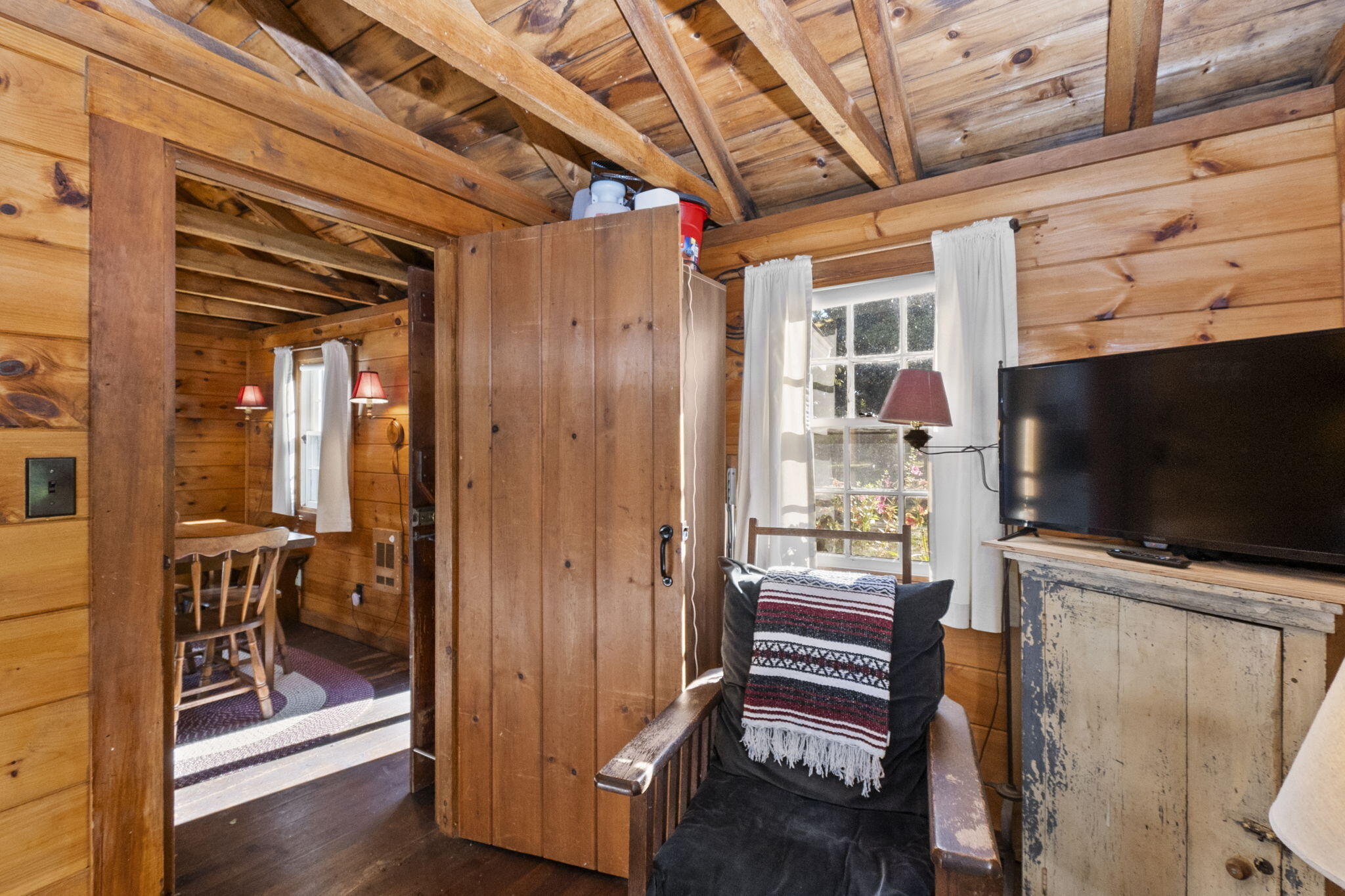 1975 State Highway, Unit 5 Eastham, MA 02642 - Photo 16 of 28 a view of outdoor living room and wooden floor