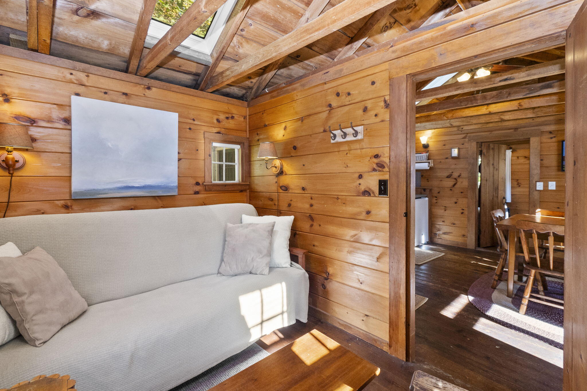 1975 State Highway, Unit 5 Eastham, MA 02642 - Photo 17 of 28 a living room with furniture and wooden floor