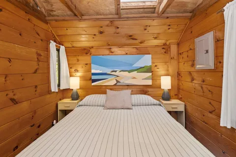 a view of a balcony with wooden floor