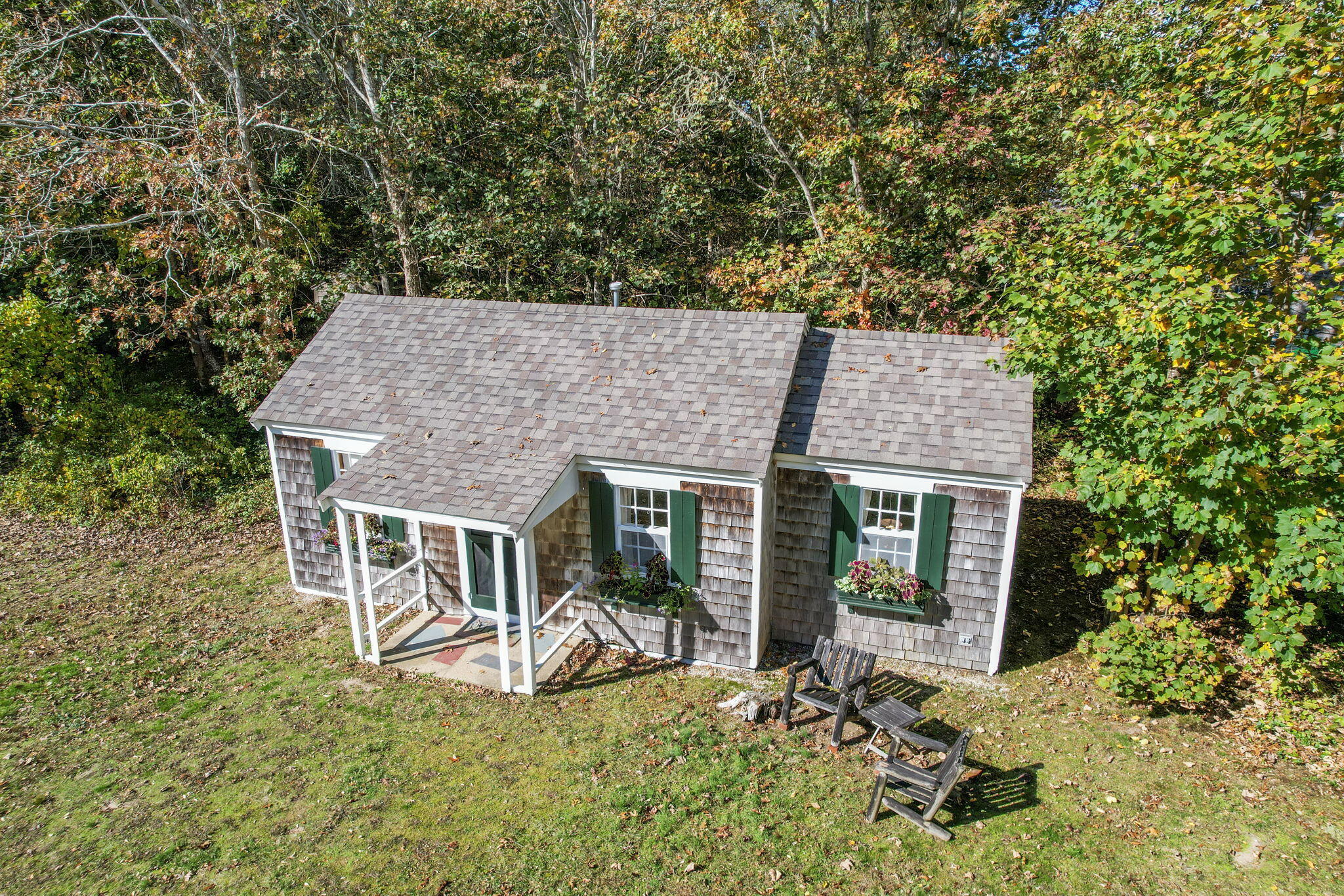 1975 State Highway, Unit 5 Eastham, MA 02642 - Photo 25 of 28 front view of a house with a yard