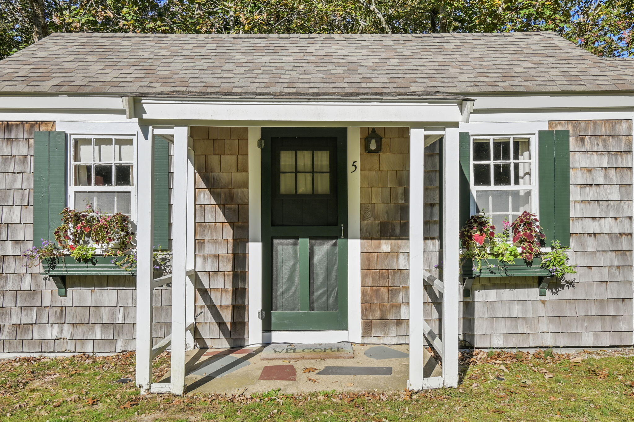 1975 State Highway, Unit 5 Eastham, MA 02642 - Photo 28 of 28 a front view of a house with a porch