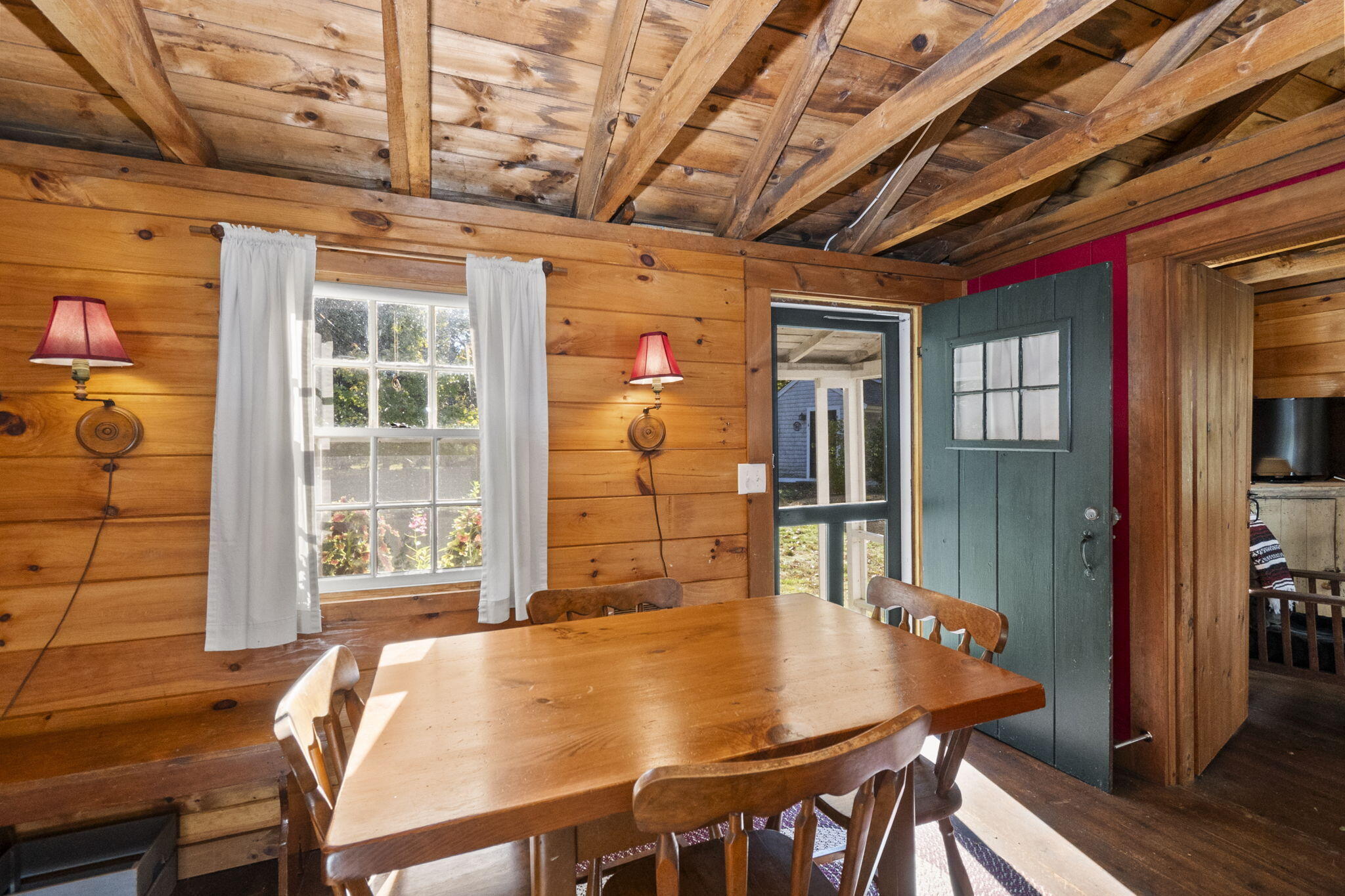 1975 State Highway, Unit 5 Eastham, MA 02642 - Photo 6 of 28 a view of a dining room with furniture window and wooden floor