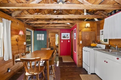 a view of a dining room with furniture