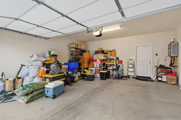 a view of a garage with a bike and car