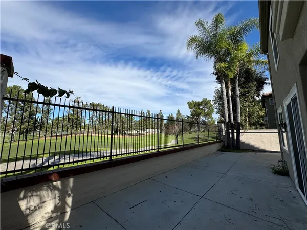 a view of a wrought iron balcony