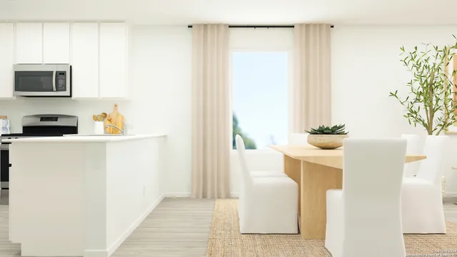 a view of kitchen and living room