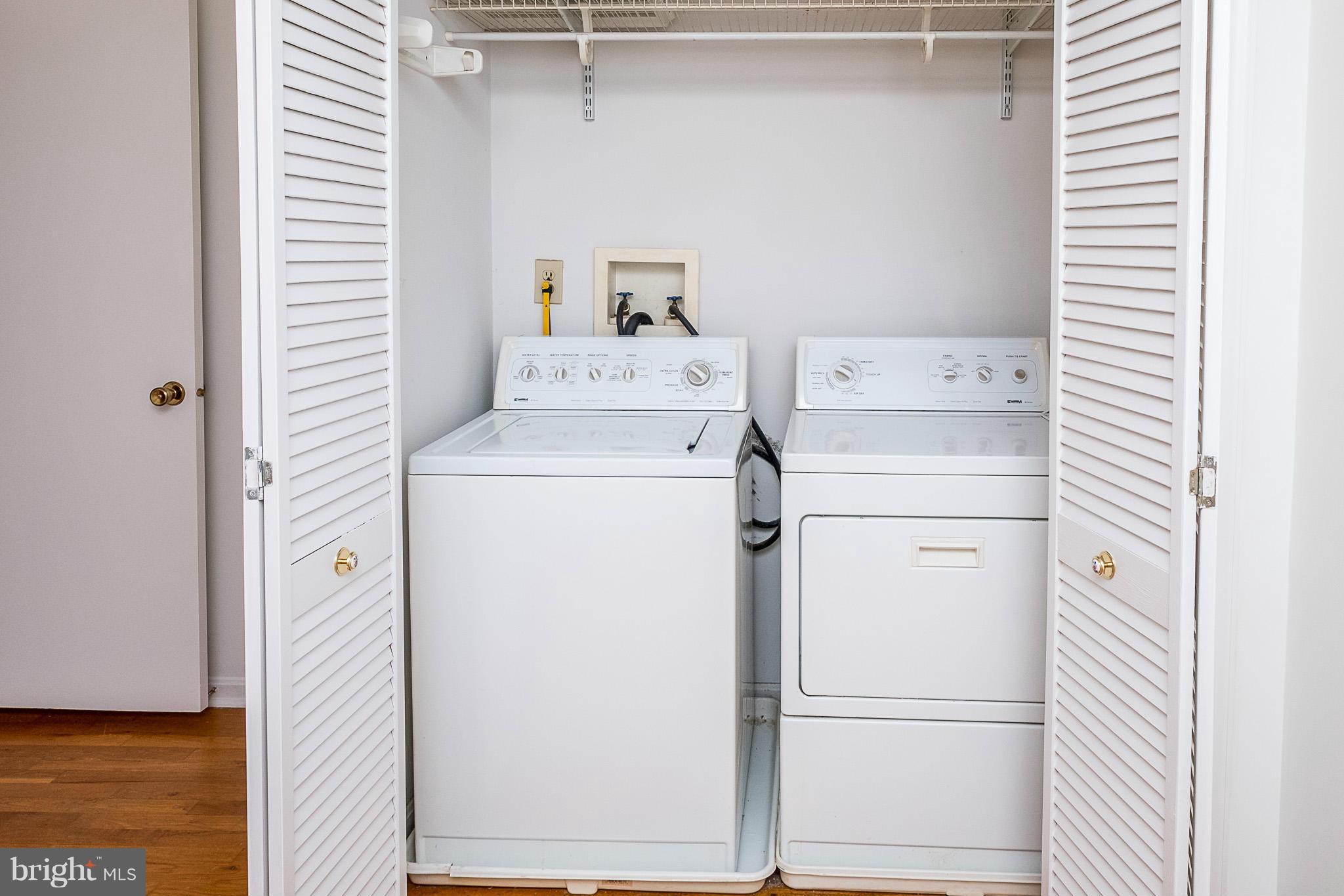 1412 Winding Waye Lane Silver Spring, MD 20902 - Photo 16 of 30 a utility room with dryer and washer