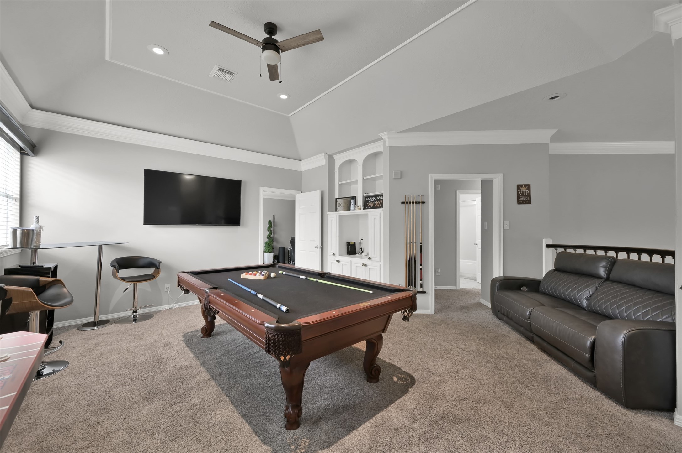 9706 Chipstead Court Spring, TX 77379 - Photo 30 of 44 Now let's venture up the stairs to your spacious game room.