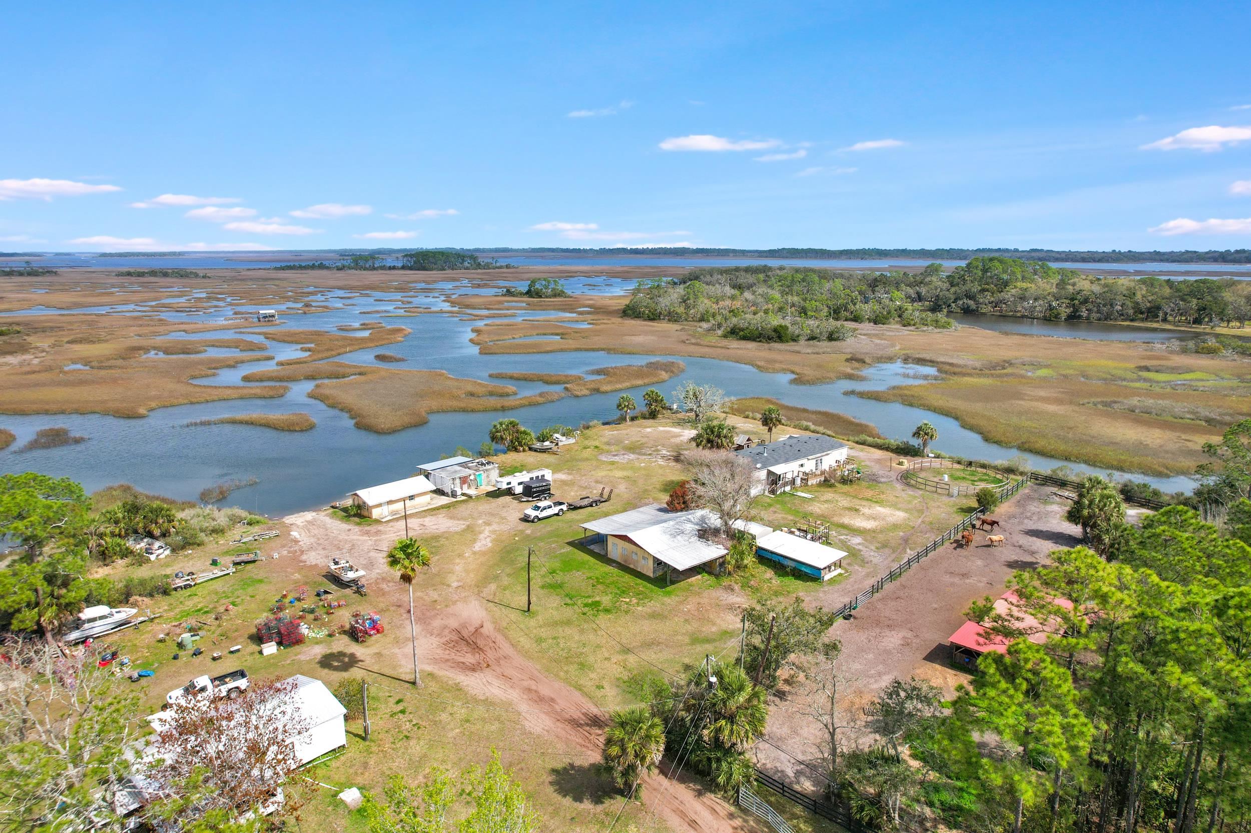 490 Coopers Cove Road St. Augustine, FL 32095 - Photo 1 of 13 a view of an ocean and beach