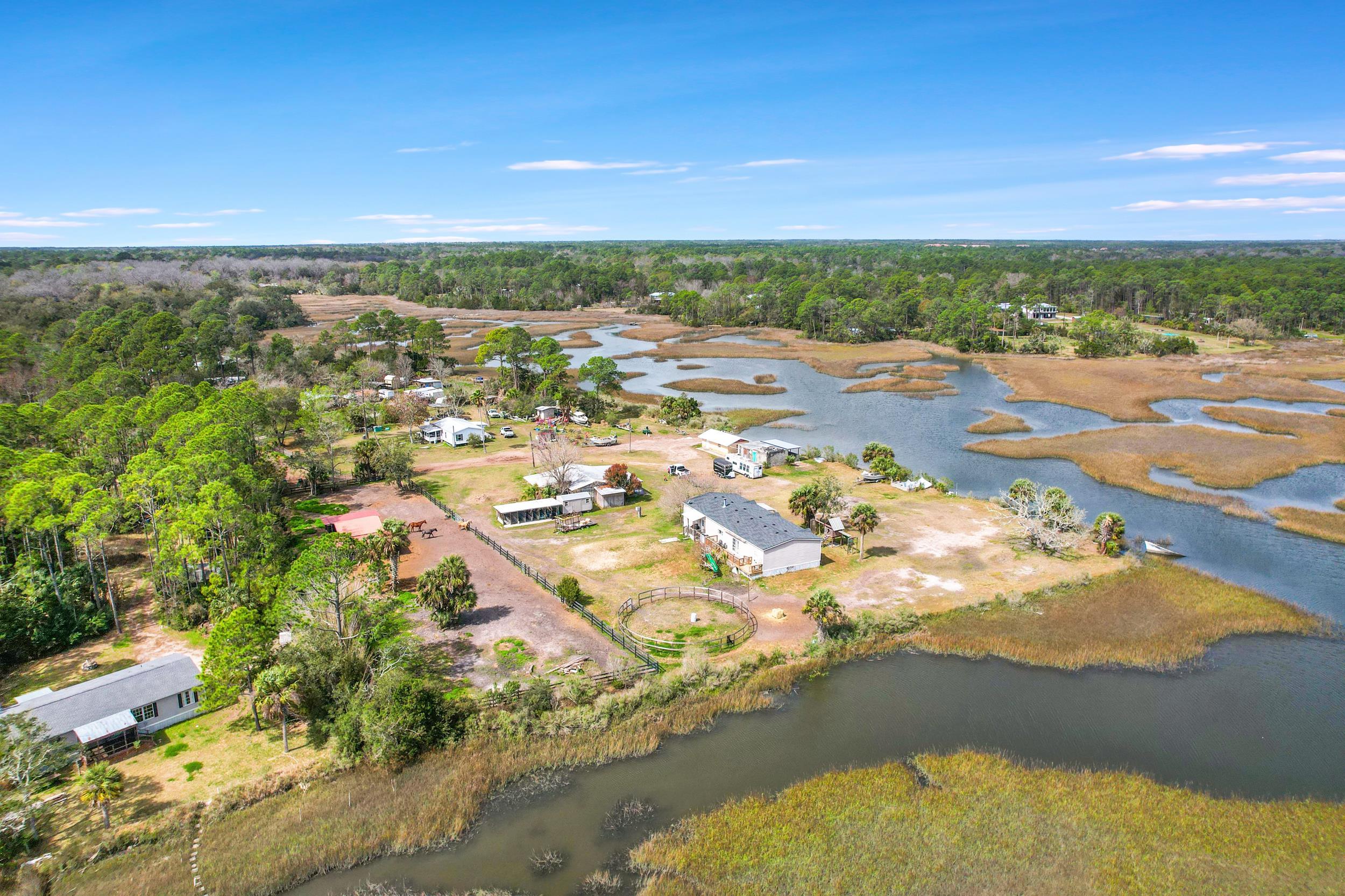 490 Coopers Cove Road St. Augustine, FL 32095 - Photo 11 of 13 an aerial view of residential houses with outdoor space