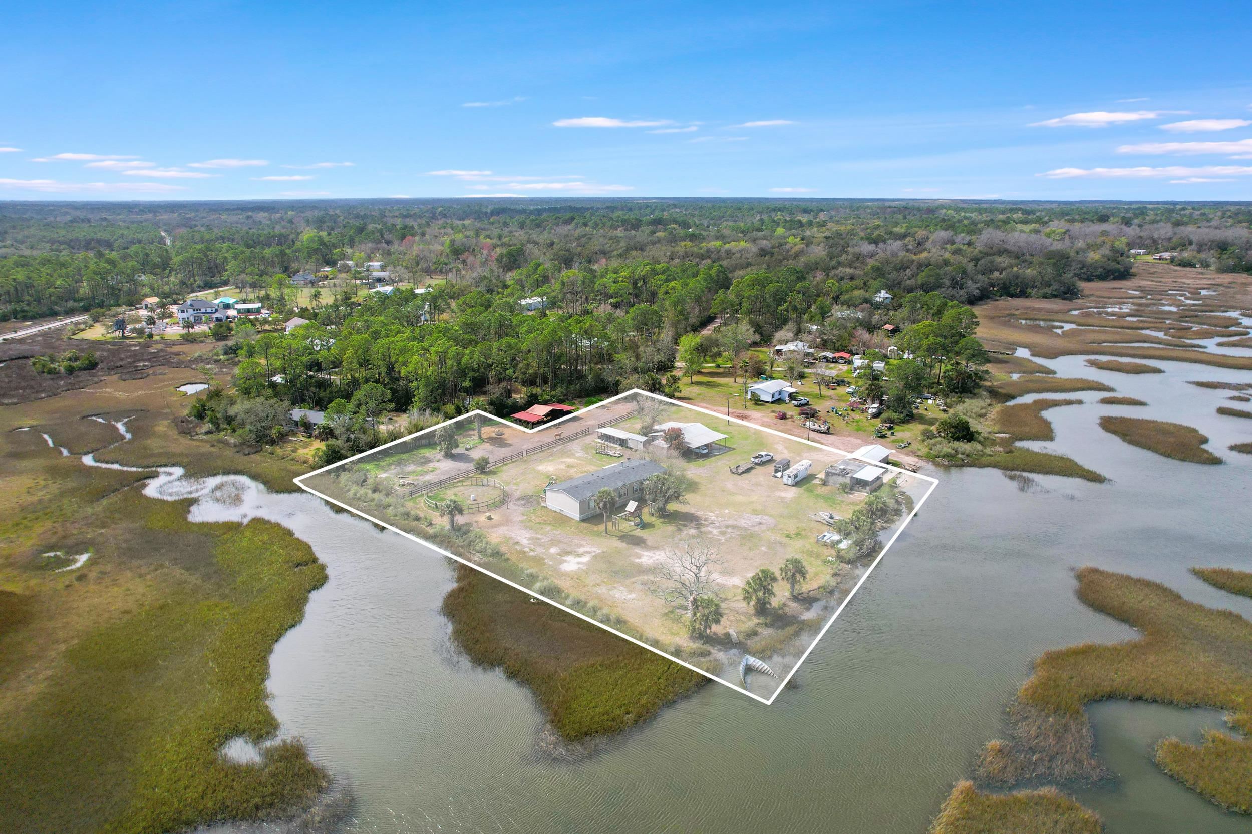 490 Coopers Cove Road St. Augustine, FL 32095 - Photo 13 of 13 a view of a city from a balcony