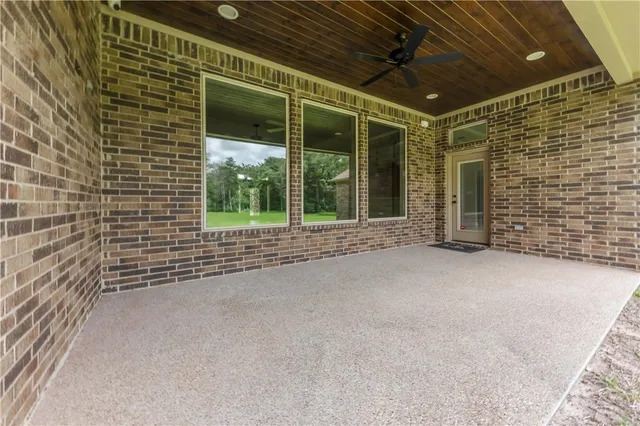 a view of an empty room with a balcony
