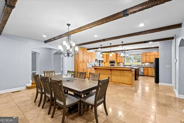 a bedroom with a bed window and a dresser