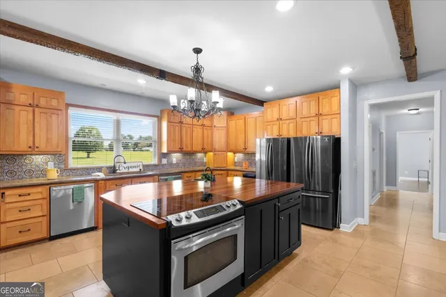 a view of a livingroom with furniture and wooden floor