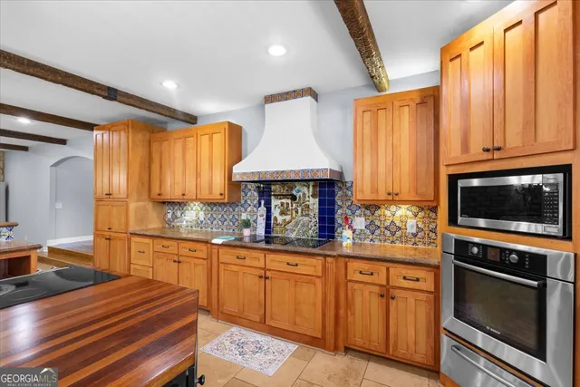 a view of hallway with wooden floor