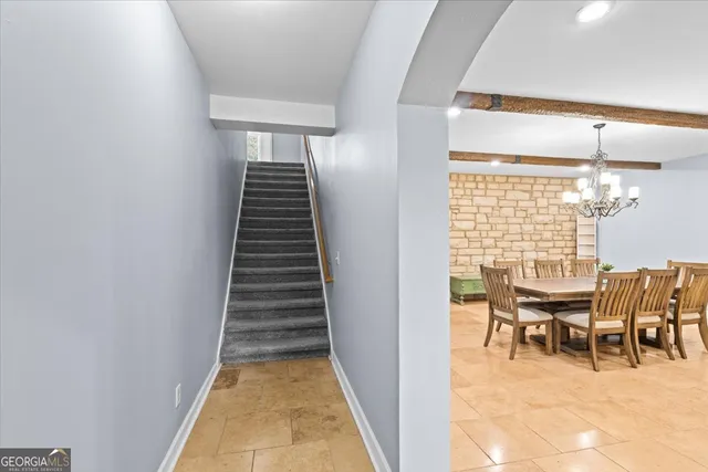 a view of swimming pool with an outdoor space and seating area