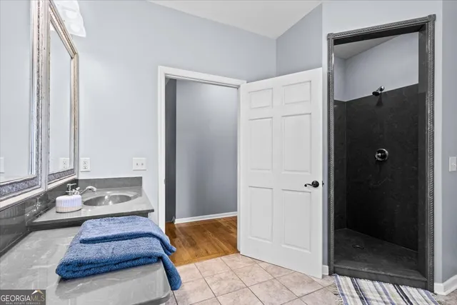 a view of a swimming pool with an outdoor space and seating area