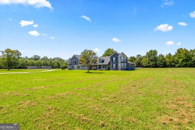 a view of workspace with hardwood floor