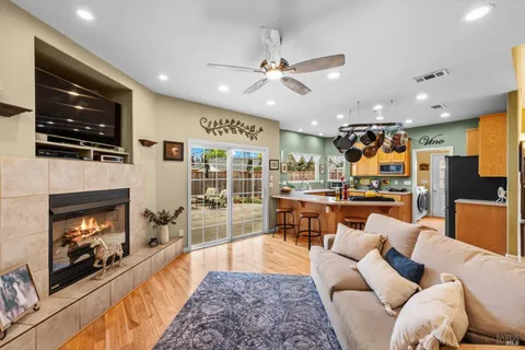 a living room with furniture and a table