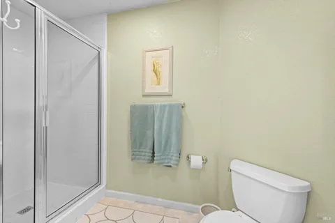 a view of a house with backyard and porch