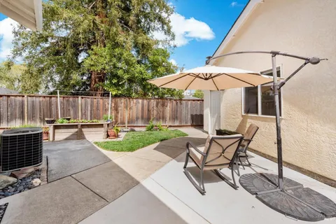 a outdoor living space with patio furniture and a potted plant
