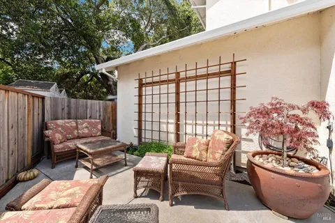 an aerial view of a house with outdoor space