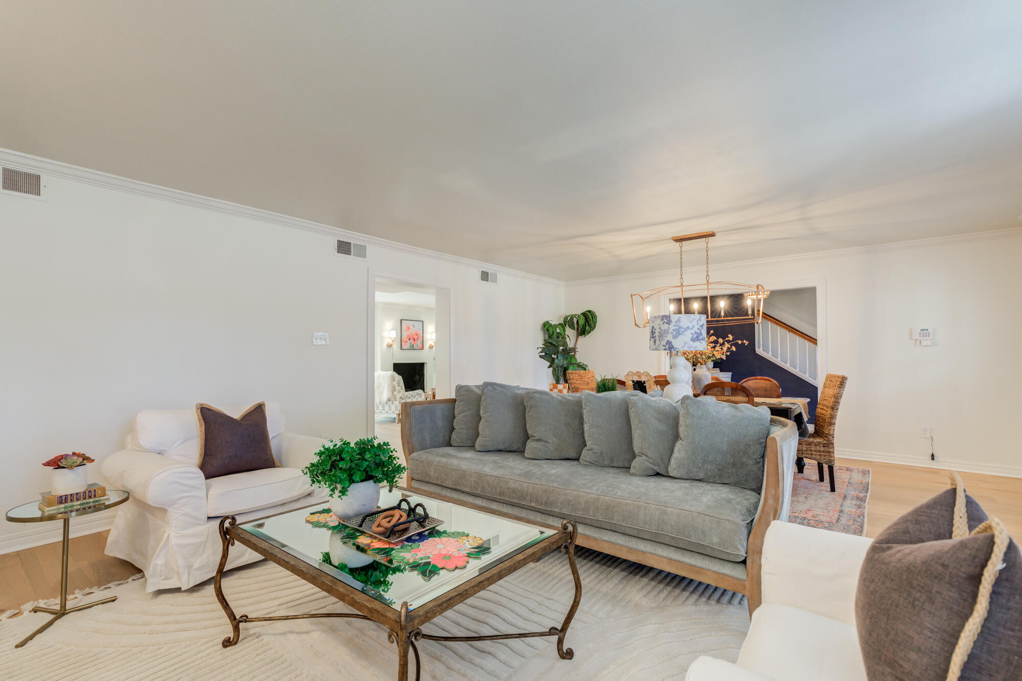 4407 13th Street Lubbock, TX 79416 - Photo 12 of 88 a living room with furniture and wooden floor