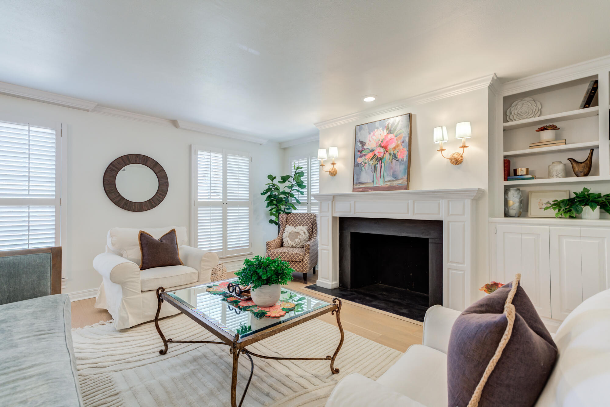 4407 13th Street Lubbock, TX 79416 - Photo 15 of 88 a living room with furniture potted plant and a fireplace